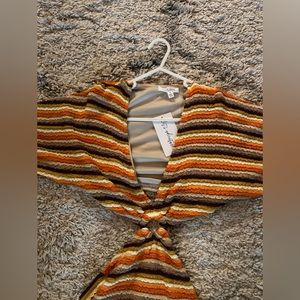 12th tribe cut out body con dress. Never worn. Tags still on. Size small